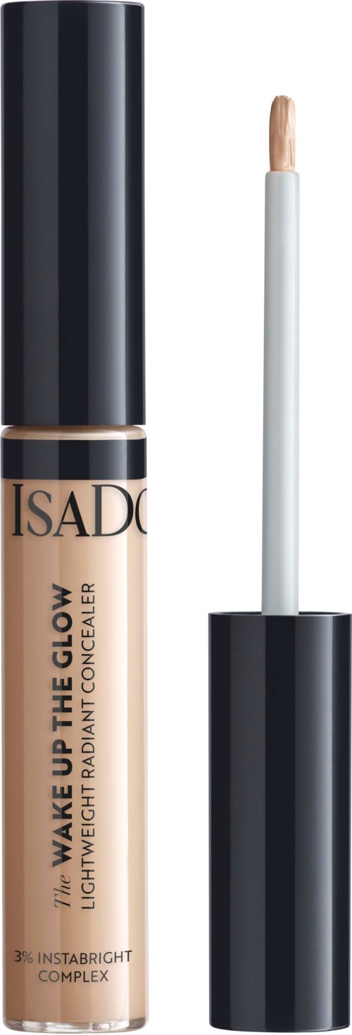 En concealertub med svart lock och en applikator, märkt 'ISADORA' och 'WAKE UP THE GLOW'.