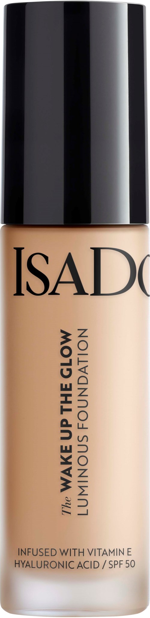 En foundationflaska med svart lock och beige vätska, märkt 'Isado' och 'Wake Up The Glow', med SPF 50.