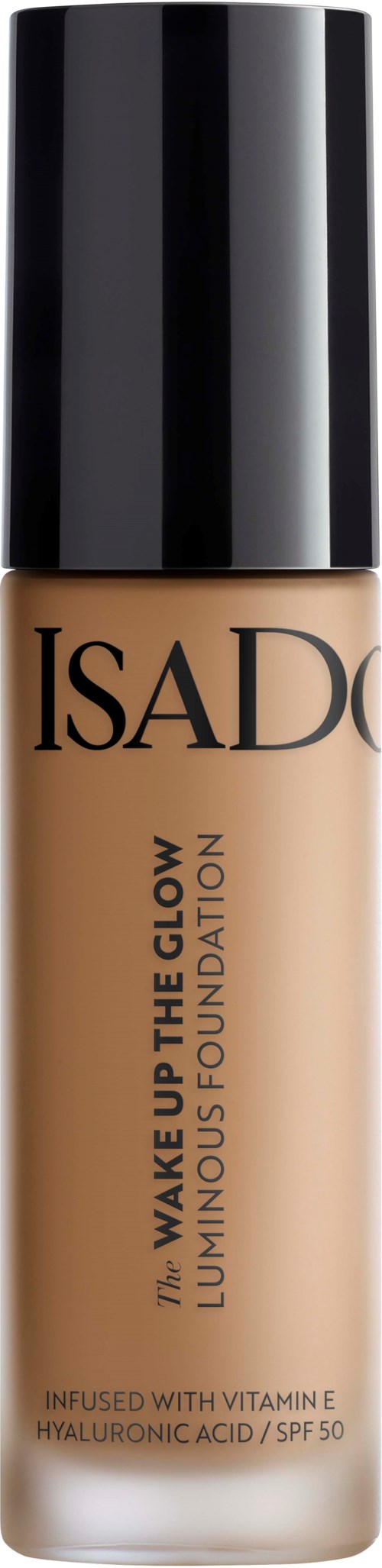 En flaska av ISADÓ foundation märkt 'Wake Up The Glow. Luminescent Foundation,' infunderad med vitamin E och SPF 50.