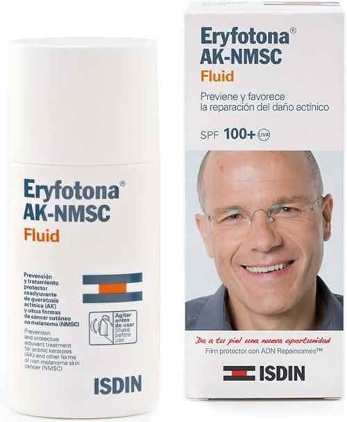 Das Gesicht eines Mannes auf einer Verpackung, die Sonnencreme und Hautschutzprodukt bewirbt, mit SPF 100+ und lachendes Gesicht.