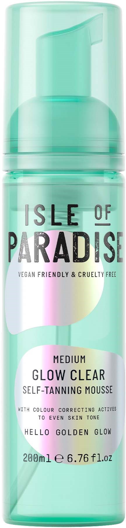 En lang, lysegrønn flaske med pumpe, merket Isle of Paradise glow clear self-tanning mousse.