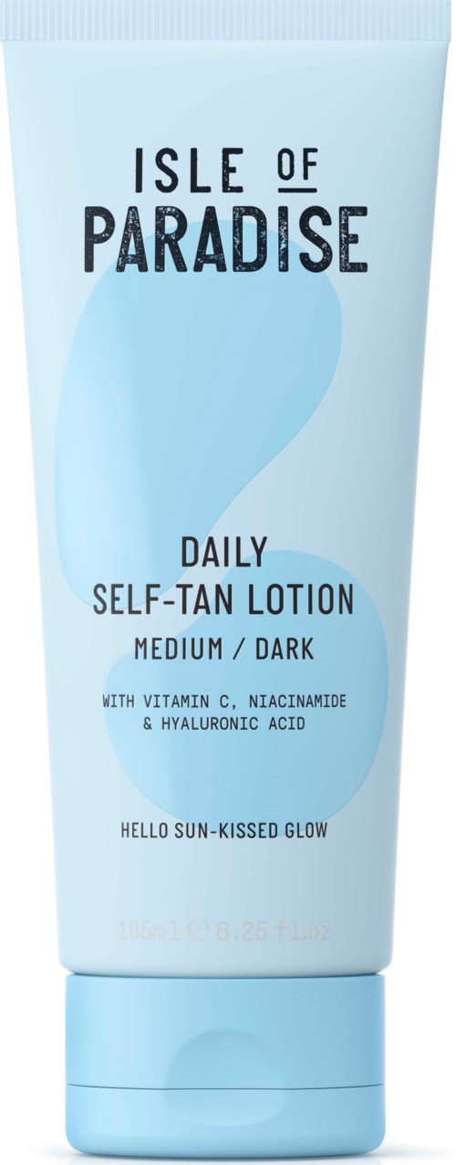 A light blue tube of Isle of Paradise self-tan lotion for medium/dark skin, with vitamin C and hyaluronic acid, and a sun-kissed glow.