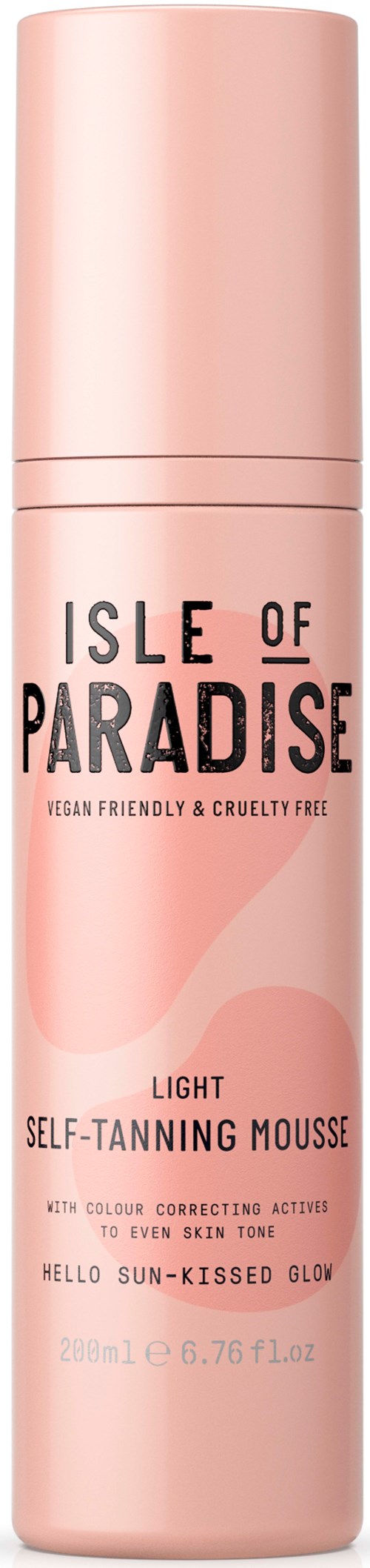 A tall pink bottle labeled 'Isle of Paradise' with product details for self-tanning mousse, cruelty-free and vegan.