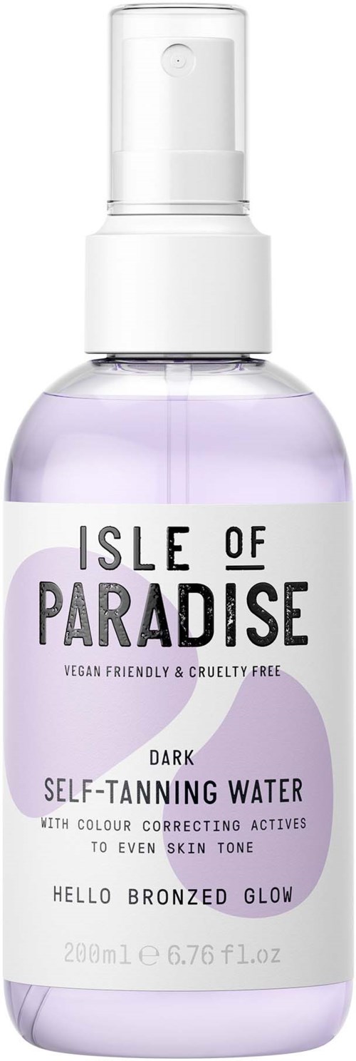A lavender-colored bottle with a spray top, labeled 'Isle of Paradise Dark Self-Tanning Water' for a bronzed glow.