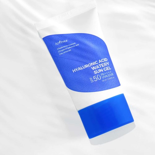 A white tube with a blue label, mentions hyaluronic acid water sun gel, SPF 50+, UVB and UVA protection.