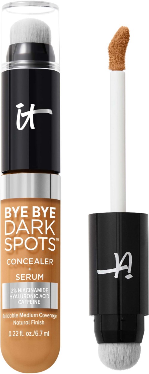 A concealer pen with a sponge applicator and a matching sponge-tipped blending tool, used for covering dark spots.