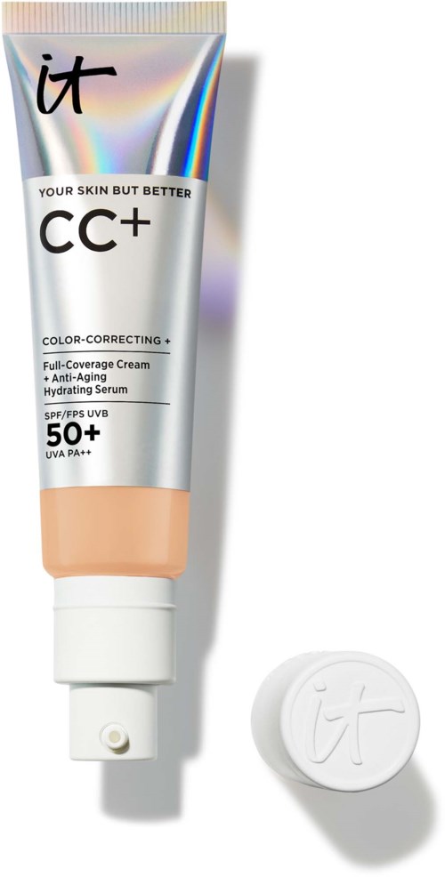 Eine Tube CC+ Creme mit weißem Deckel und rundem Deckel mit Logo. Markiert als volle Abdeckung, Anti-Aging, SPF 50+.