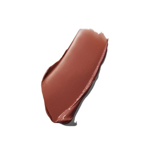 A smear of light brown creamy substance with shiny surface and smooth texture.