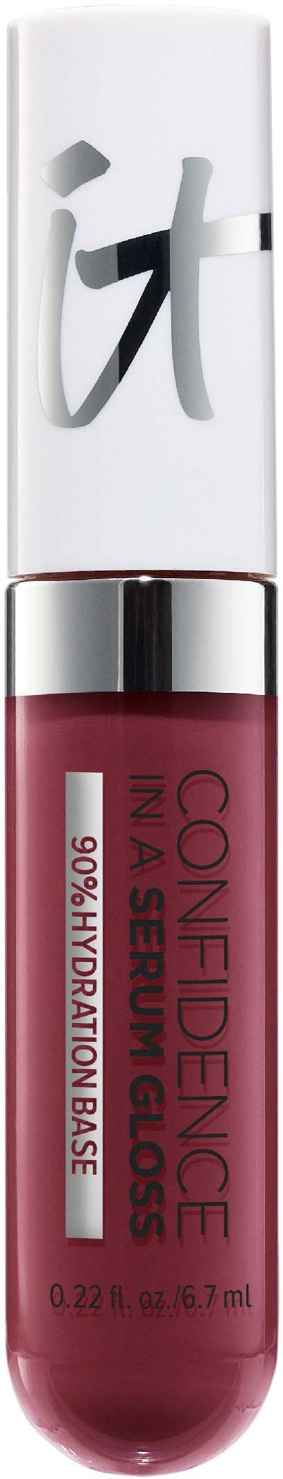 A lipstick tube with a white cap and a pink body, labeled "CONFIDENCE IN A SPOOLING LIP" and 