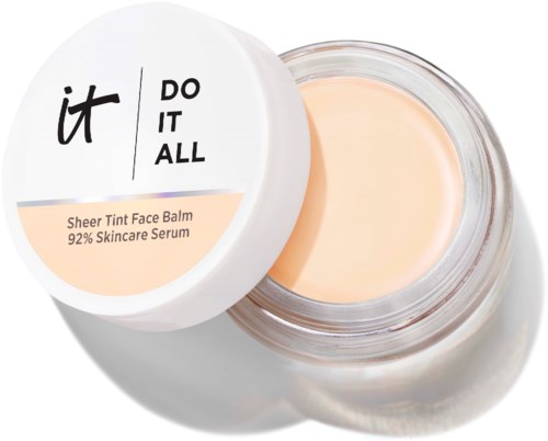 Kermansavi Sheer Tint Face Balm, jossa valkoinen kansi ja musta ja persikanvärinen teksti, sisältäen balsamin.