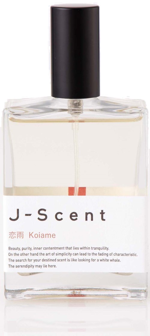 En tydlig parfymflaska i glas med svart topp och vit etikett som visar produktnamnet J-Scent och annan text.