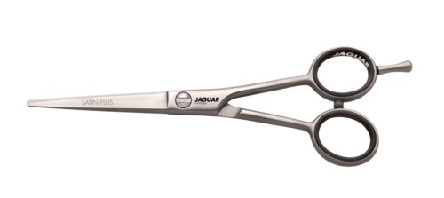 A pair of small, silver surgical scissors with black handles labeled Jaguar.