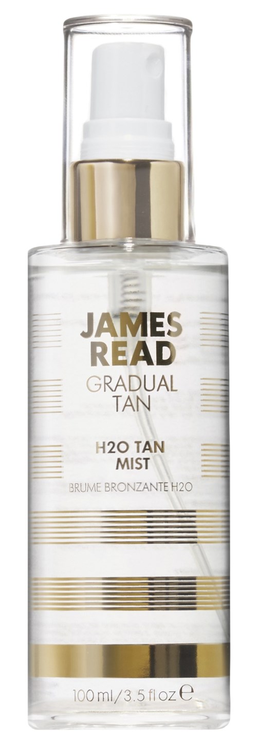 Eine klare Sprühflasche mit goldenen und schwarzen Streifen, genannt James Read Gradual Tan, enthält H2O Tan Mist.