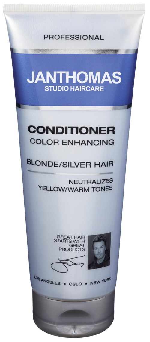 A tube labeled Janthomas conditioner for blonde or silver hair, neutralizing yellow and warm tones. Contains a picture and signature.