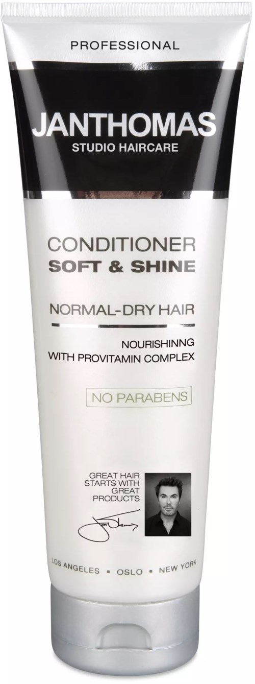 A hair conditioner labeled for normal to dry hair, with nourishing formula, no parabens, and a small photo of a man.