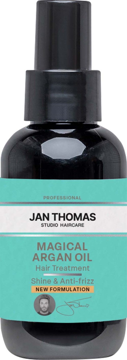 A black spray bottle labeled Jan Thomas Magical Argan Oil for hair, with a spray nozzle and teal label.