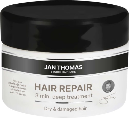 A jar labeled 'Jan Thomas Hair Repair' for deep treatment for dry, damaged hair.