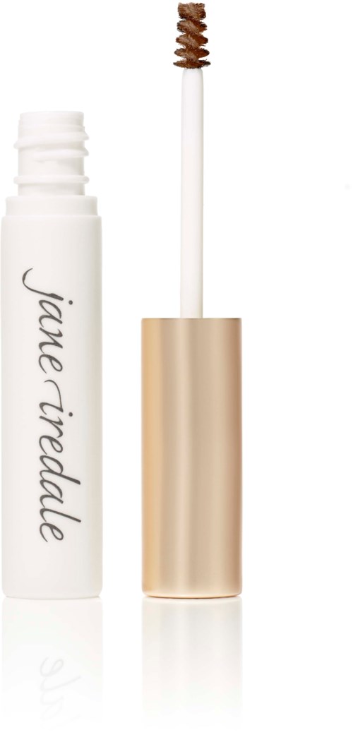 En vit tub med guldlock och en borstar applicator. Den har namnet Jane Iredale skrivet på den.