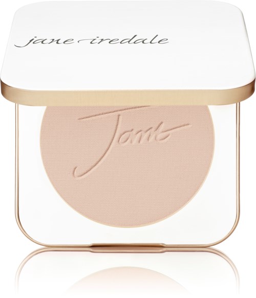 A round face powder with a light beige shade in a metal case, branded with Jane Iredale. The case has a white lid.