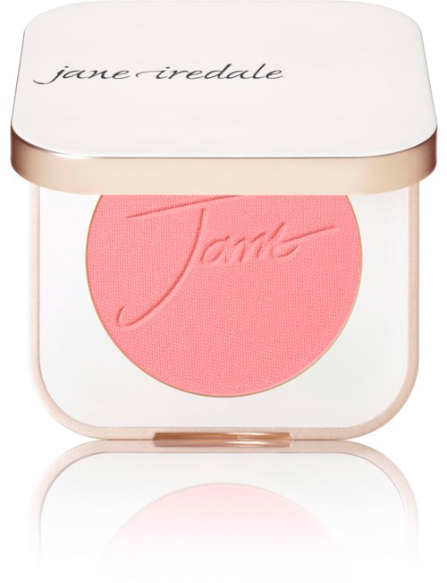 En rosa blush i ett vitt kompakt med ett roséguldsläge, märkt 'Jane Iredale'.