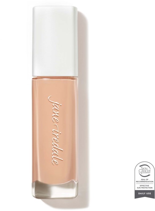A beige liquid lipstick in a clear tube with a white cap. The brand name is written on the tube.