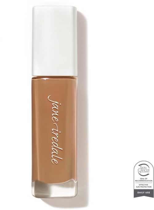 A beige liquid foundation in a clear bottle with white cap, labeled 'Jane Iredale'.
