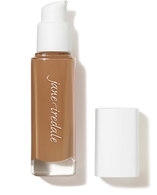 A bottle of liquid foundation with a white pump and a separate white cap, labeled 'jiale ride'.