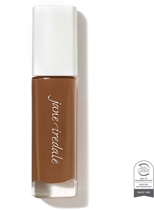 A brown lipstick with white cap and brand name on the tube, standing upright.
