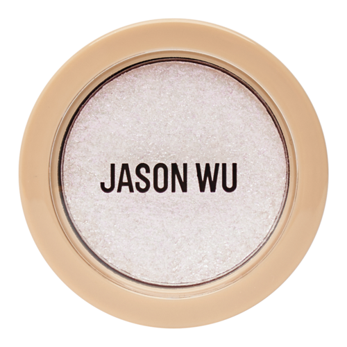 En rund kosmetisk produktförpackning med pastellbeige skal, visar namnet 'JASON WU' i svarta bokstäver inuti.