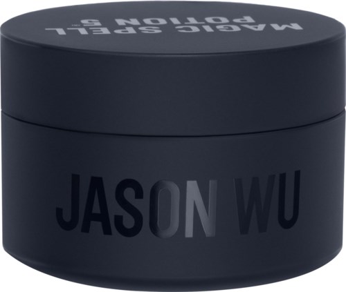 En mörk rund behållare med namnet "JASON WU" på.