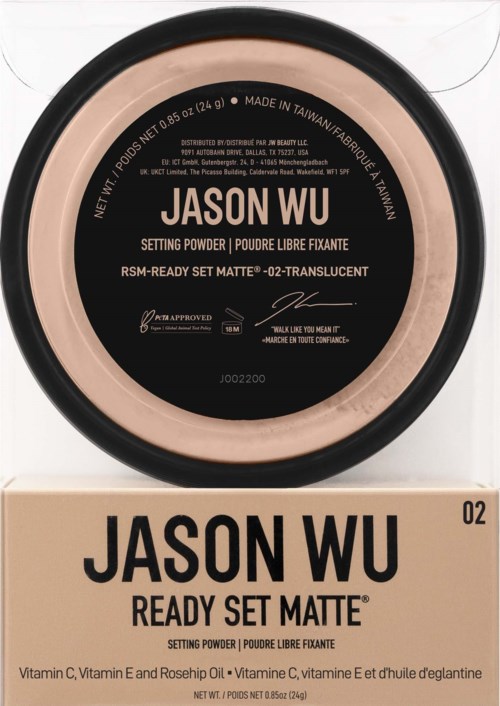 Rund burk med Jason Wu setting powder, svart lock, etikett i svart och beige, och en beige låda som märker produkten.