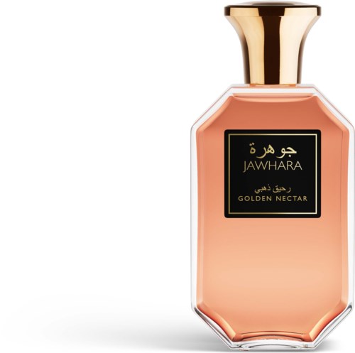 A perfume bottle with a golden cap and a peach-colored liquid inside, labeled Jawhara Golden Nectar.