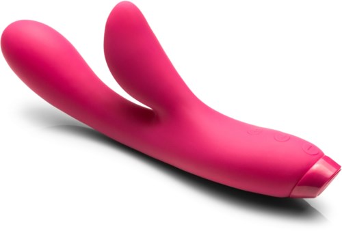 Pinkki kaksoispääharava, jossa on painikkeet kädensä ja tarkoitettu aikuisviihteeseen.