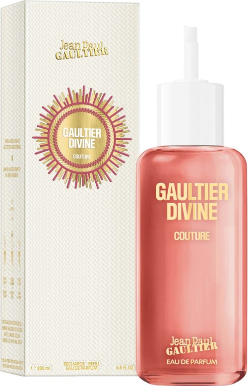 Een parfumfles en doos met roze vloeistof, gelabeld Gaultier Divine Couture, Jean Paul Gaultier.