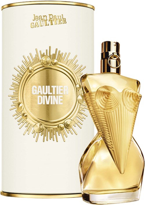 Gouden en heldere glazen parfumfles met kegelvorm, en een witte cilinderdoos met gouden details.