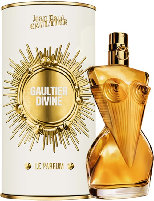 Een parfumbottle naast een witte container met gouden ontwerp en tekst voor Gaultier Divine door Jean Paul Gaultier.