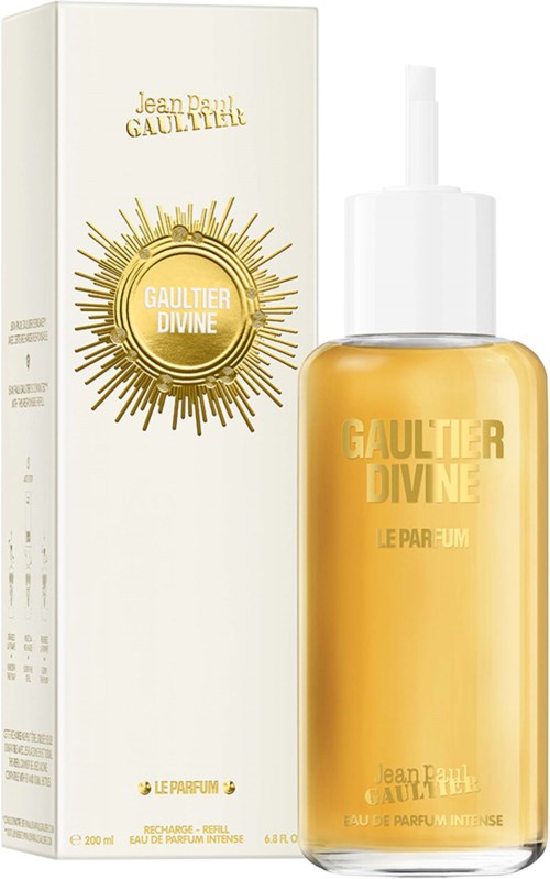 Een parfumfles met een witte en gouden doos erachter, labeled Gaultier Divine.