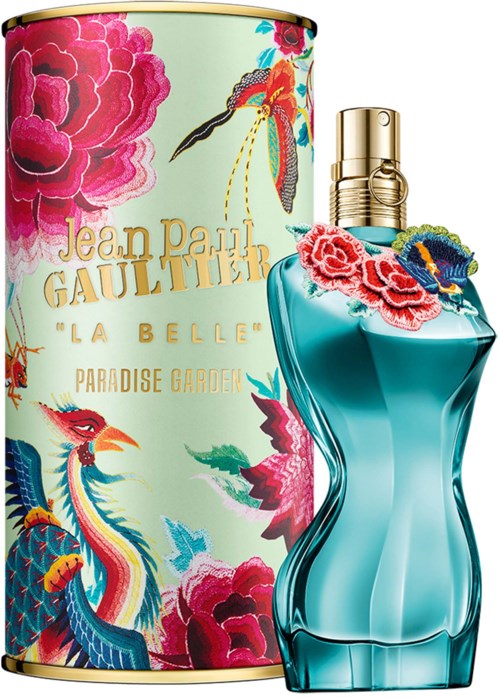 Een parfumfles met bloem- en vogeldesign, gemerkt Jean Paul Gaultier La Belle, Paradise Garden, met kleurrijk kunstwerk.