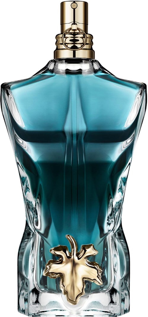 A perfume bottle shaped like a torso, with gold accents and a gold emblem at the bottom.