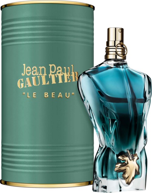 Een parfumfles in de vorm van een gespierde man met een gouden handaccessoire en een teal cilindervormige doos.