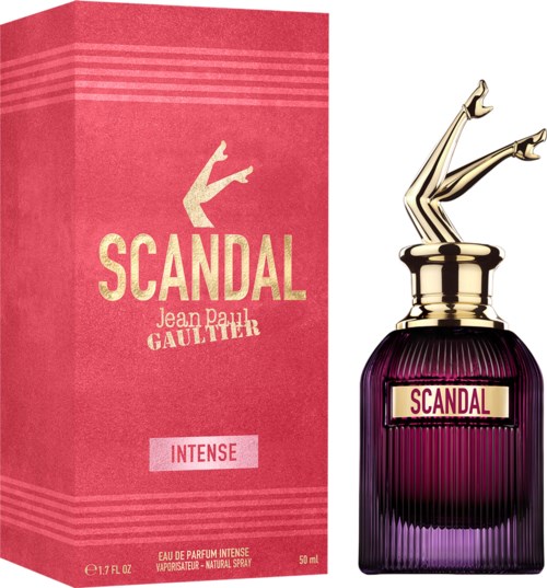 Een parfumdoos en fles, roze en paars, met benen die uit de dop komen.