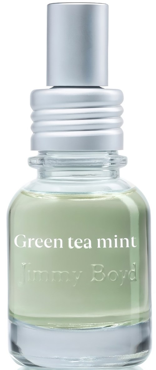 Een klein flesje met een zilveren dop bevat groene thee munt geurende vloeistof. Het label zegt Green tea mint van Jimmy Boyd.