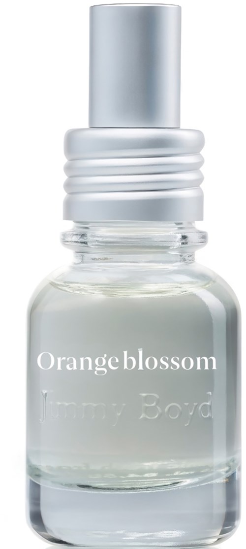 Een klein doorzichtige fles met zilveren dop met label Orange Blossom parfum.