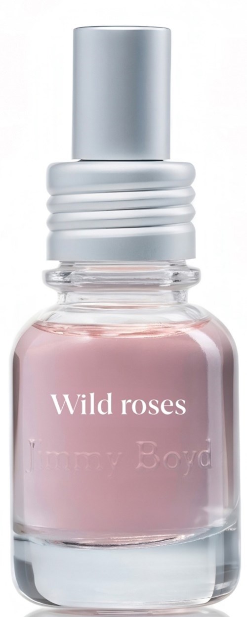 A small bottle of pink nail polish labeled Wild Roses with a silver cap.