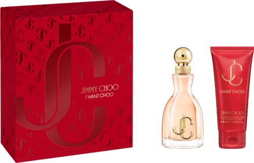 Jimmy Choo I Want Choo tuoksupullo ja saman sävyinen vartaloöljypakkaus punaisessa laatikossa logomaisesti.