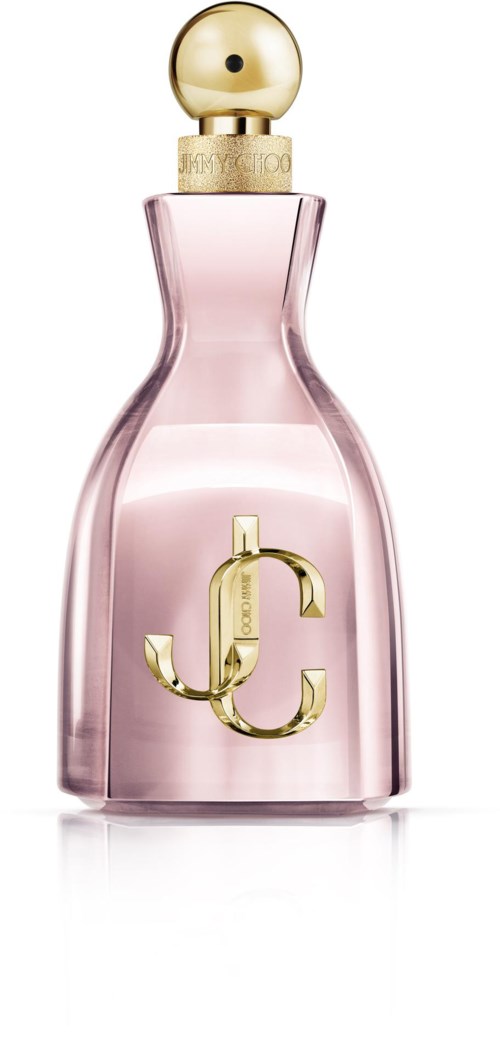 Een roze parfumfles met gouden details en een ronde gouden dop, met een groot gouden logo op de voorkant.