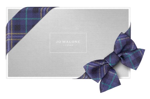 Jo Malone London gift box with a plaid ribbon bow.