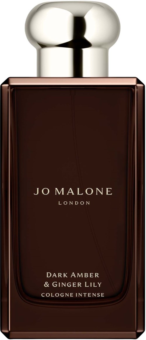 Tummanruskea hajuvesipullo hopeisella pyöreällä korkilla ja etiketti jossa lukee Jo Malone London, Dark Amber & Ginger Lily.