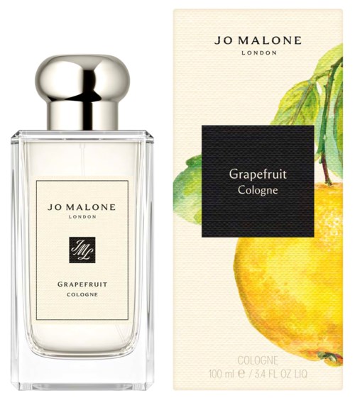 En parfyllflaska märkt Jo Malone London med grapefruktdoft, bredvid dess box med citron och citronblad.