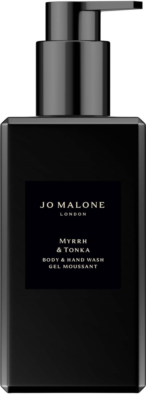  Tyylikäs musta pullo pumpulla, etikettissä Jo Malone London Myrrh & Tonka vartalohuuhteluaine.